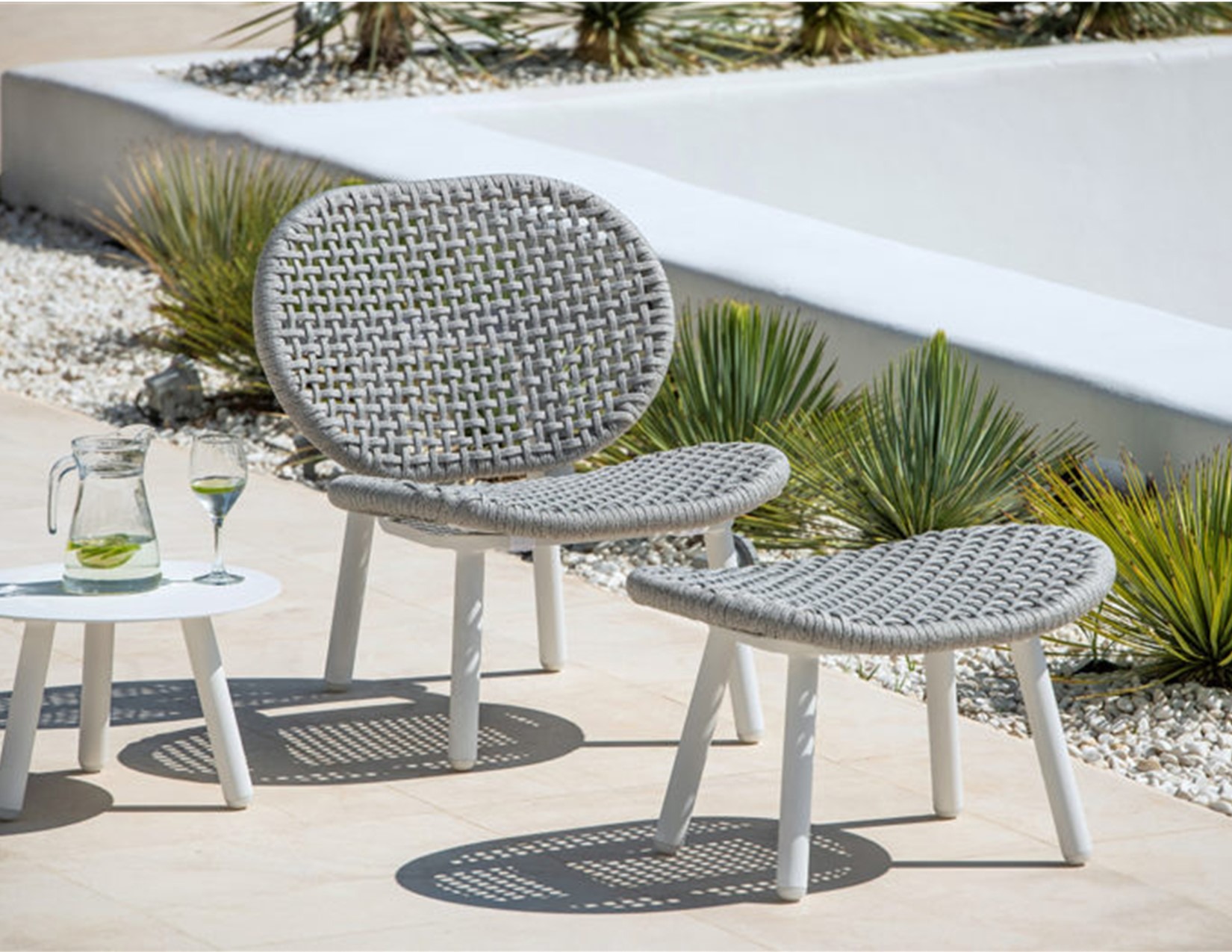 https://www.coutureoutdoor.com/wp-content/uploads/2020/05/abi-modern-rope-white-black-cushionless-no-cushion-weave-outdoor-design-latest-2020-sofa-seat-hotel-hospitality-contract-home-palm-beach-miami-california.jpg